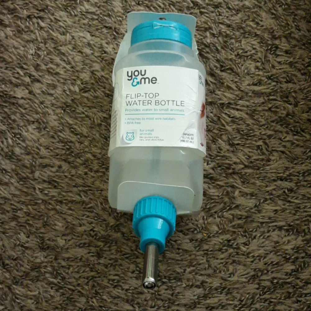 #310NWT You&Me flip top water bottle. Size: 16.7 fl oz